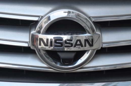 Front view camera installation in Nissan badge